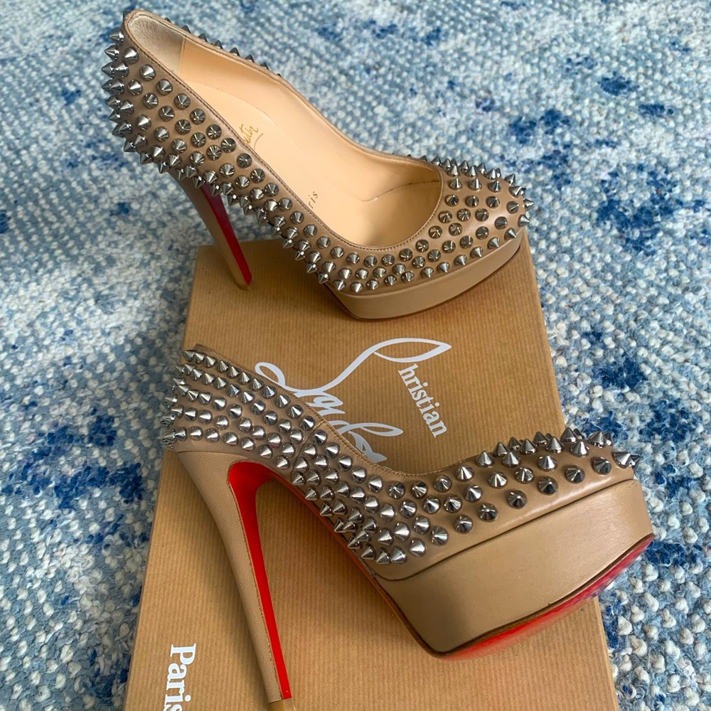 Never-worn Louboutin spiked platform pump